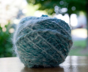 ball of handspun angora and merino wool blend yarn